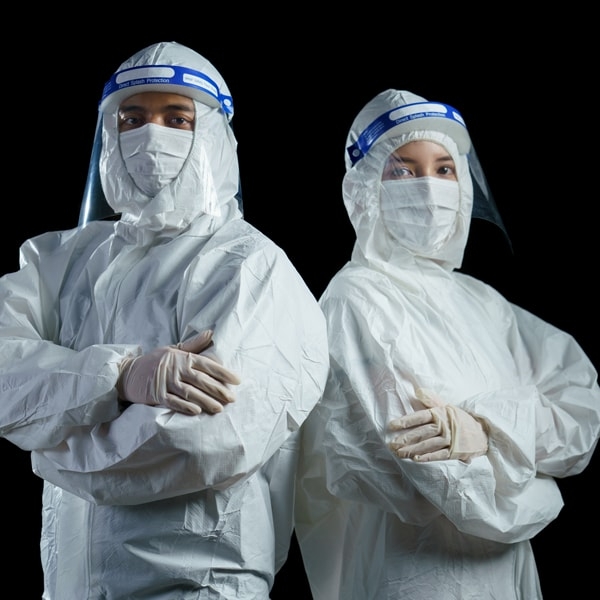 Face Shield and Misc PPE Worn by Man and Woman